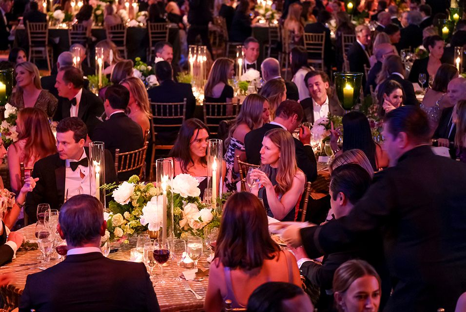 2025 Spring Ball attendees seated at tables.