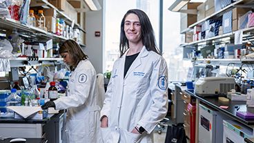 MSK researcher Dr. Mara Sherman standing in an MSK lab. 